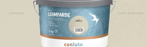 Lehmfarbe Pompeji conluto Lehmfarbe im Eimer (Farbton Pompeji) vor Wandausschnitt im selben Farbton